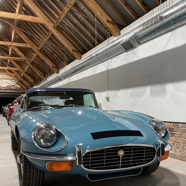 Image of a Jaguar E-Type Classic Car being stored in a controlled storage facility.